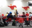 Mrs. Nora Biggs' Senior English class discusses a novel in the commons due to the ACT being given to all junior in the English and ESOL classrooms. Photo by Zach Prelutsky.