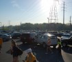 Seniors walk into school after parking their cars awry in the parking lot for a senior prank. Photo by Austin Dubinsky.