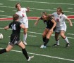 Junior Molly Cagle and Sophomore Libby Kaiser fight for the ball in a match-up against Fort Zumwalt West. The game ended in a tie 1-1, with Cagle scoring the Colt's only goal. Photo by Matthew Walter.