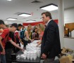 Principal Mr. Tim McCarthy surprises students at both lunches with free ice cream. The administration wanted to show their appreciation of the students' cooperation during EOCs and other testing. Photo by Meaghan Flynn.