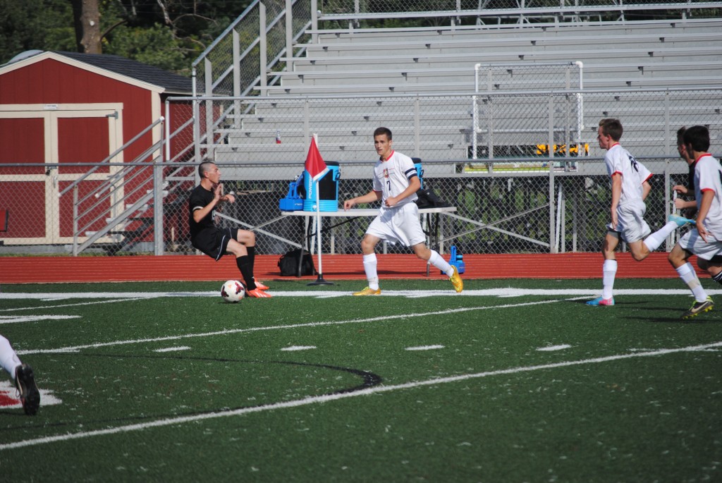 Senior Austin Mischel passes the ball to a teammate on Sept. 3 against Parkway North. 