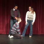 Seniors Roger Moses, Leah Ryan, and Myles Washington perform a scene at the 3 p.m. improv show.