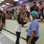 Freshman Sohana Pai throws a pie in the face of freshman principal Dr. Tori Cain.