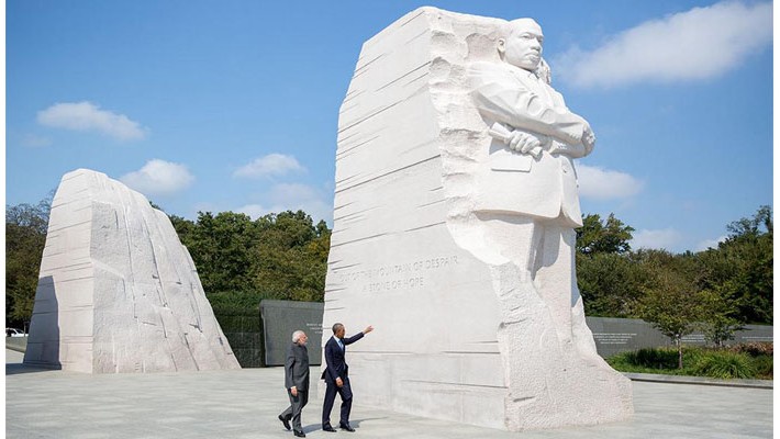 President Barack Obama walks with Prime Minister Narendra Modi, acknowledging the Martin Luther King Jr memorial. The memorial is at the National Mall in Washington, D.C.