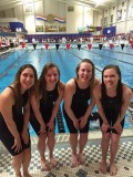 Seniors Carlie Manzick, Lucy Edele, Allison Hagge, and Junior Abby Fite stand near the St. Peters Recplex pool where they competed in the all-state championship. “I like how [swimming] is a team sport because you swim with your relays” said Abby Fite.
