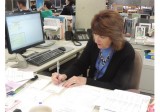 Johnston works at her desk doing daily work at the library. Every day the librarians work hard to make our library great here at North.