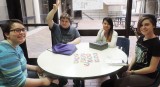 Juniors Damien Pruett, and Daniel McCulloch, along with freshman Autumn Shannon and sophomore Jordan Sanders sell pride and support bracelets on Jan. 23, during third lunch. “[I sold bracelets] because I just wanted to help,” said McCulloch.