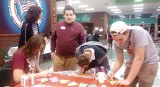 Pattonville and Hazelwood West students make crafts at North’s craft table.All three schools are already talking about preparations for a second annual “Night to Shine” dance.